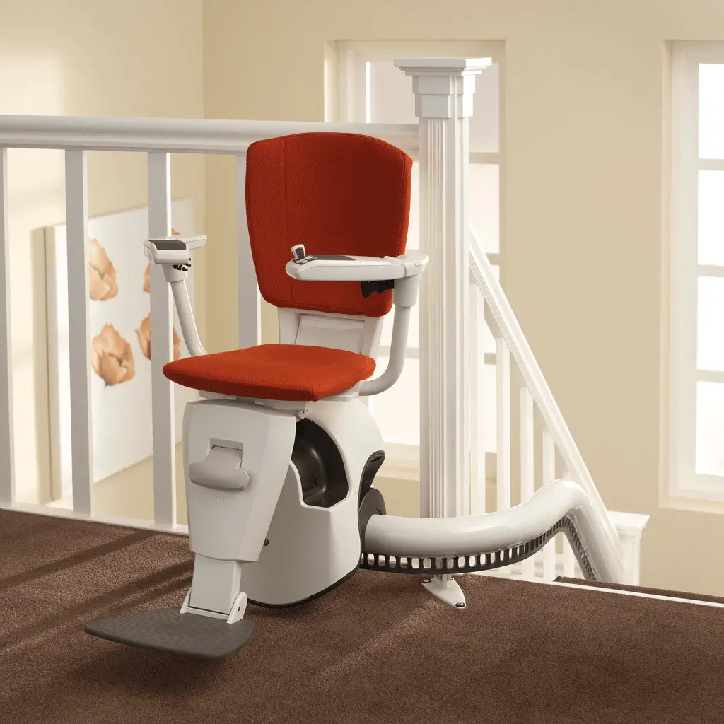 Stairlift with battery backup system on narrow stairs in Shidler
